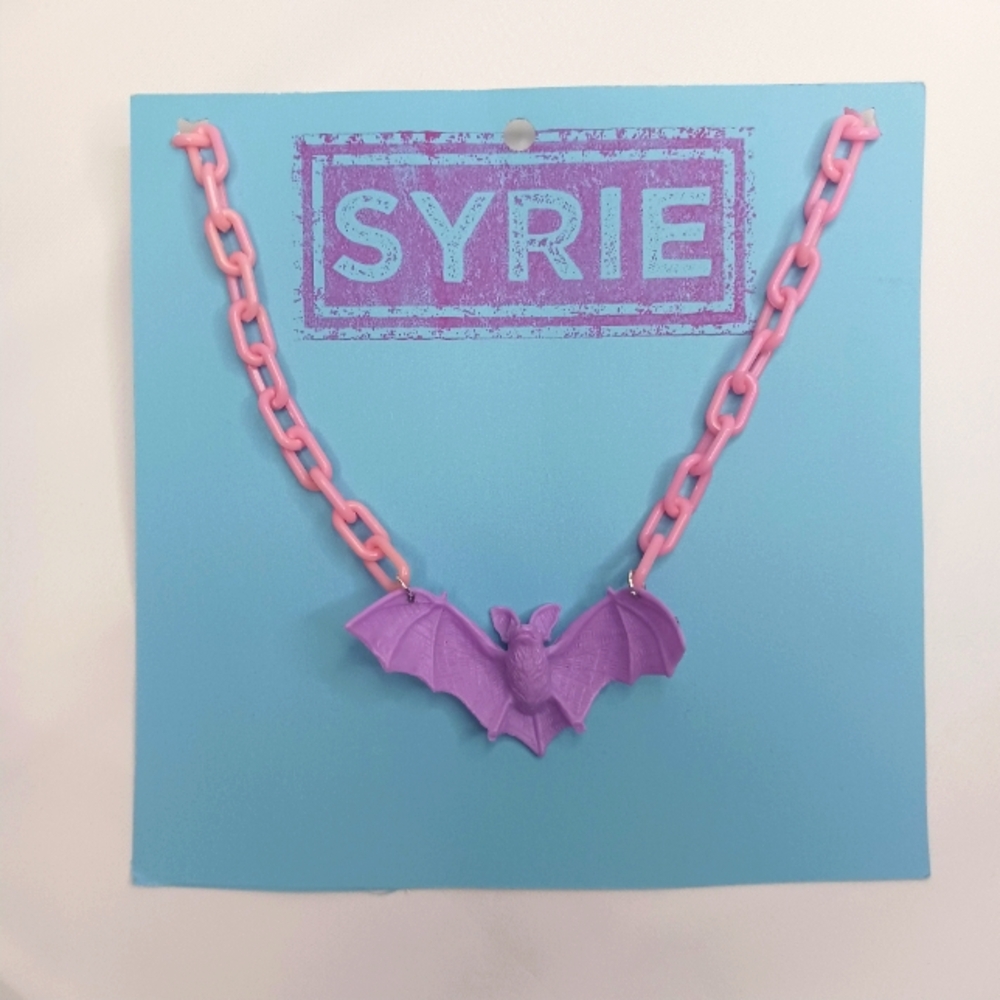 Baby Pink Plastic Link with Purple Bat Necklace.